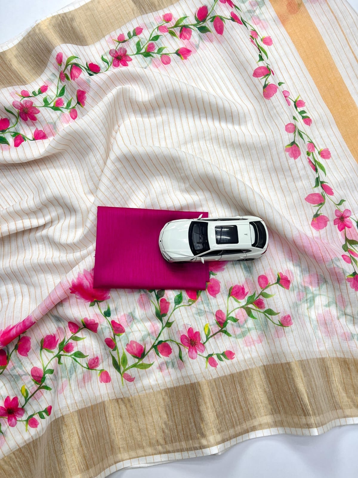 Classic White Linen saree With Vibrant Pink Louts Print