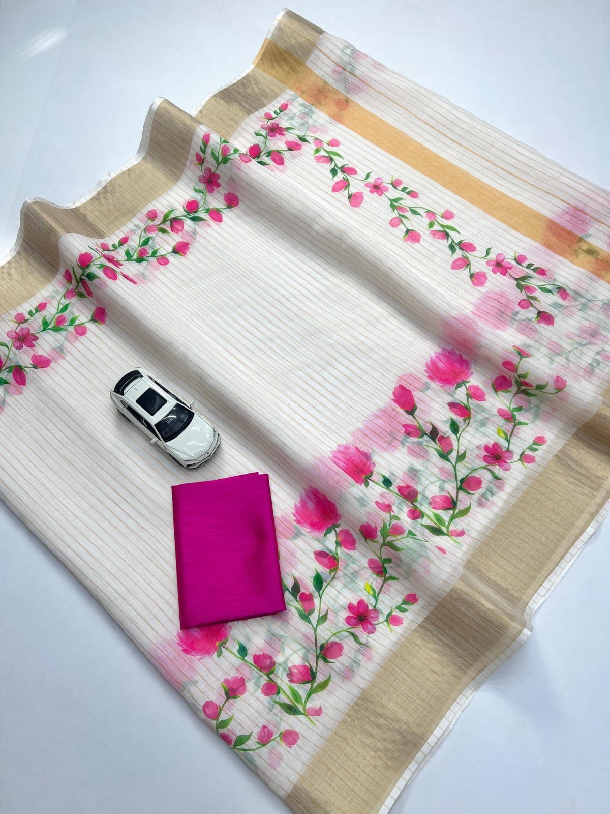 Classic White Linen saree With Vibrant Pink Louts Print