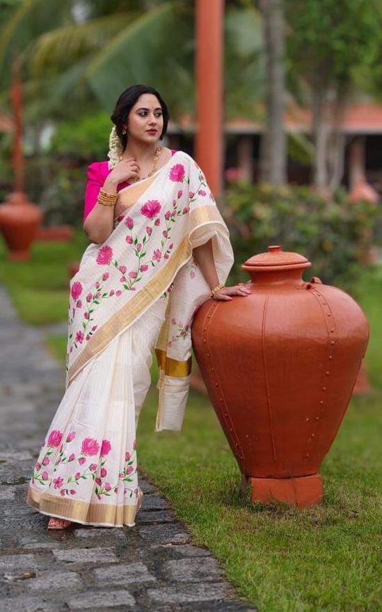 Classic White Linen saree With Vibrant Pink Louts Print